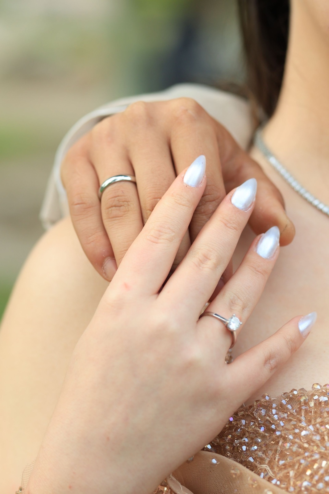 Couple showing their rings