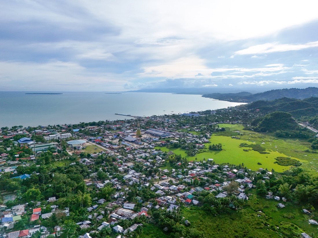 Aerial view of the town spreading along the coast