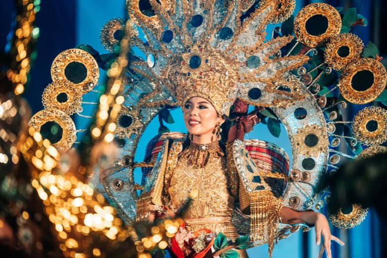 A pageant candidate in a jewelled costume