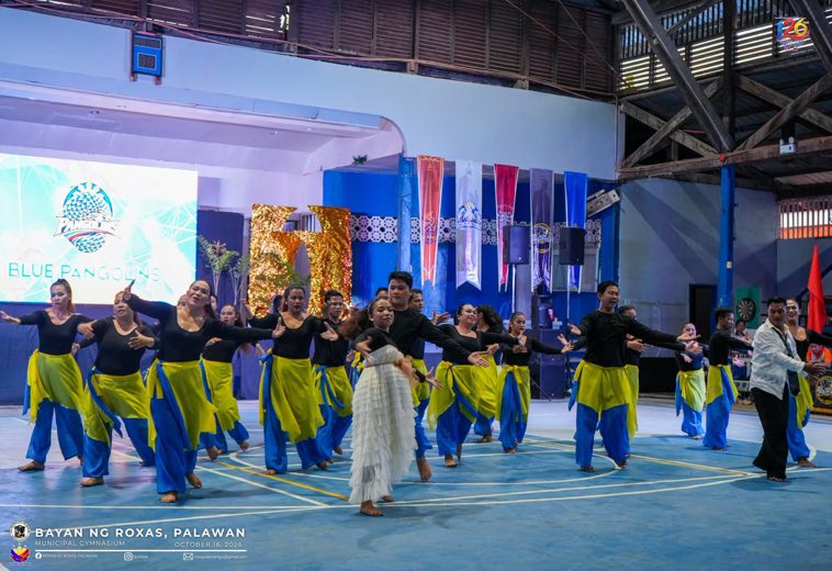 Dancers performing in the gym