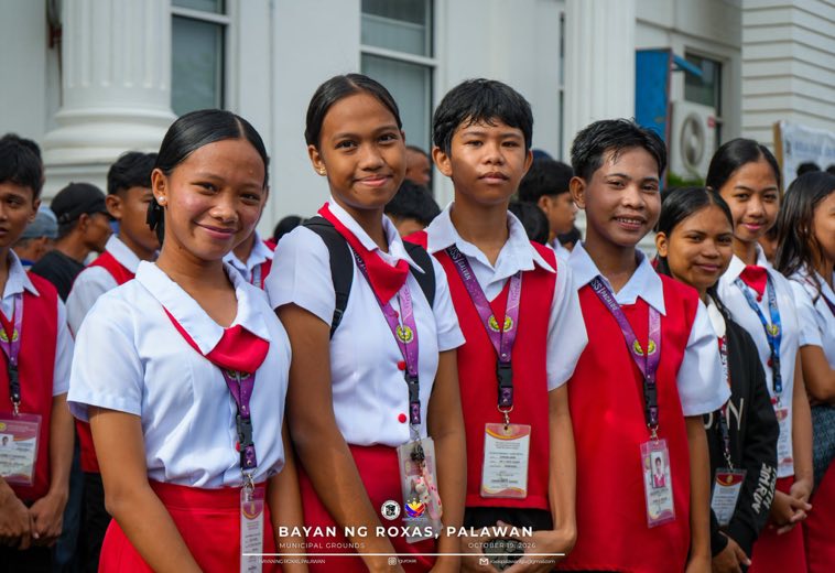 Students in red and white uniforms
