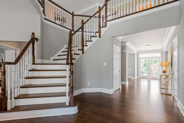 Finished staircase and foyer in a Cedar Row home