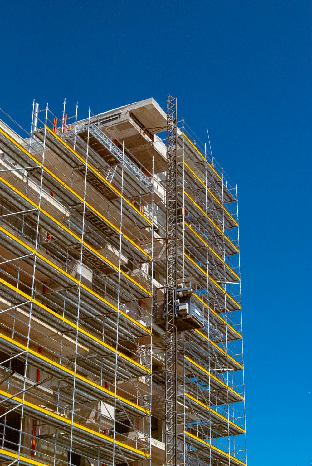 Harborview Offices under construction, wrapped in scaffolding